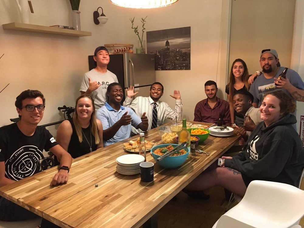 People having dinner at their communal space